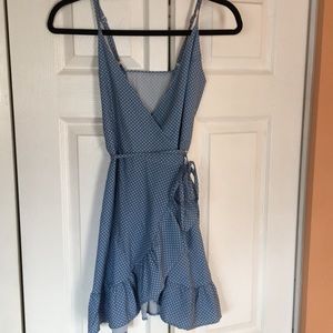 Blue polka dot mini wrap dress